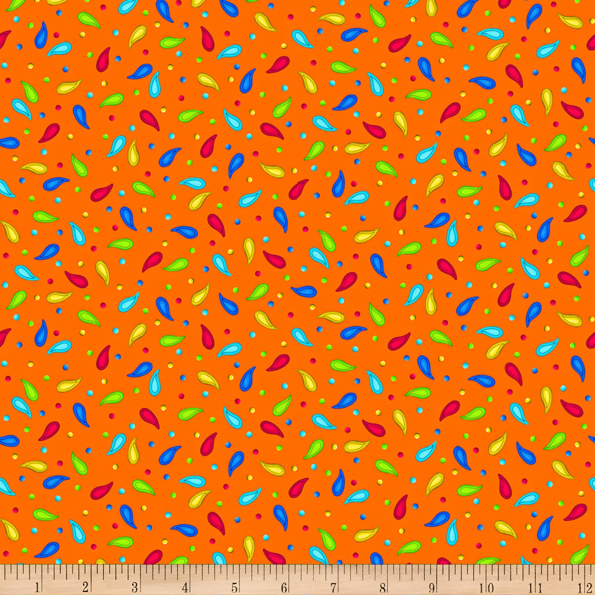 Scattered rainbow paisley teardrop shapes and coloured dots on vivid orange background coordinate quilting fabric for bold