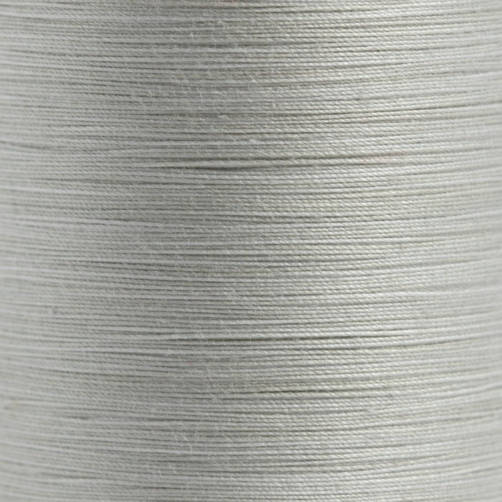 King Tut 999 Desert Wind grey variegated quilting thread closeup 500yd Superior Threads