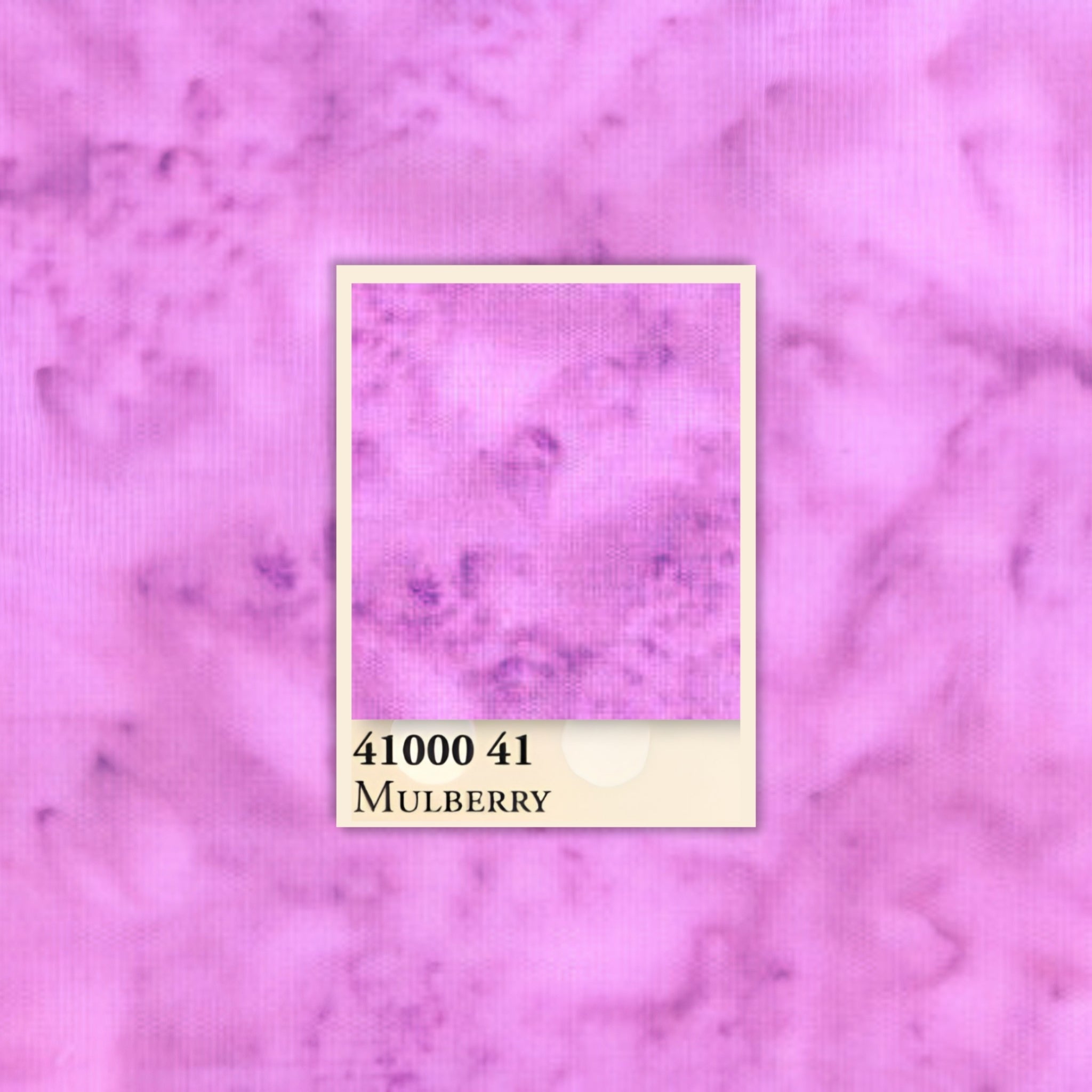 Soft pink-purple mottled batik blender fabric with subtle purple undertones for quilt backgrounds sashing and patchwork projects