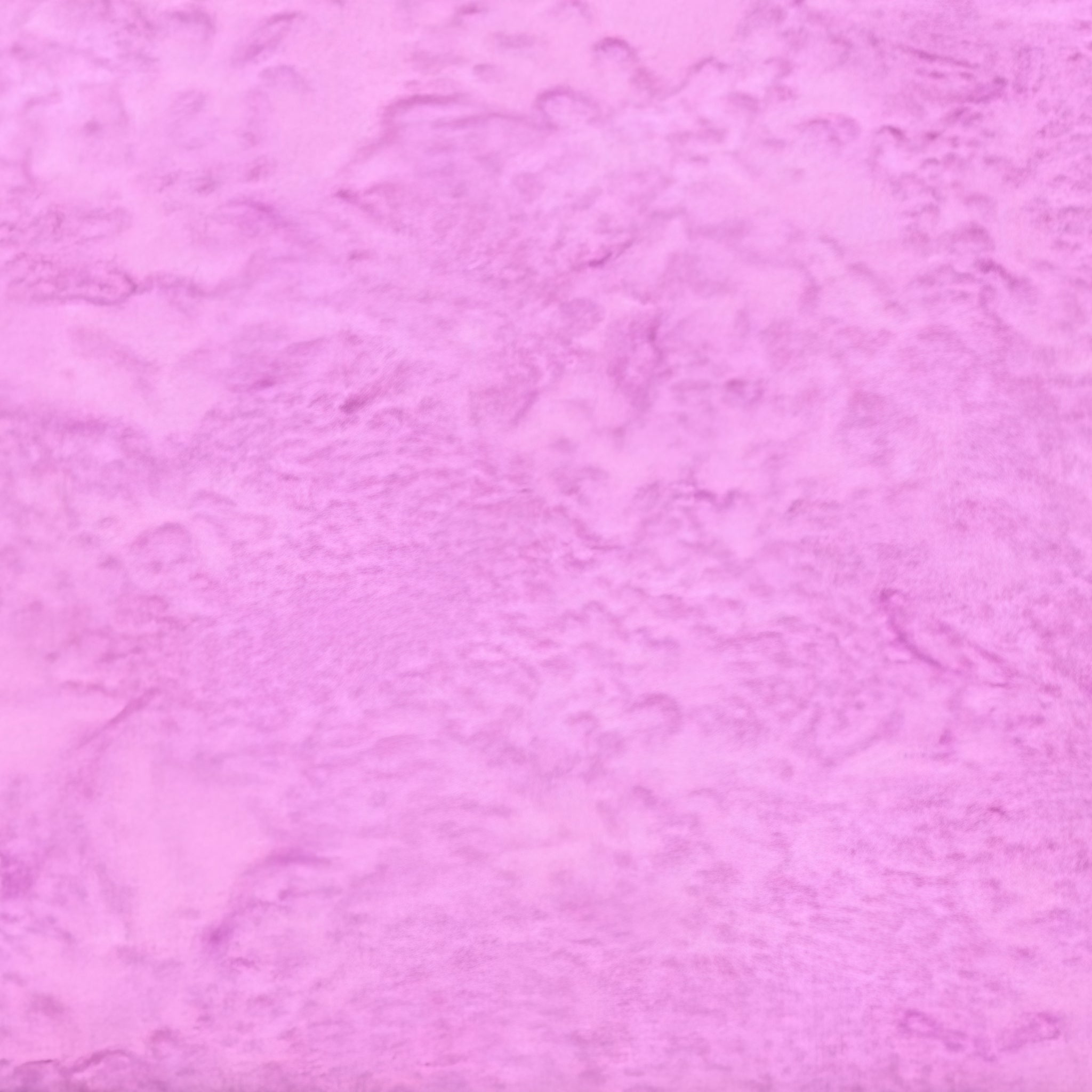 Soft pink-purple mottled batik blender fabric with subtle purple undertones for quilt backgrounds sashing and patchwork projects