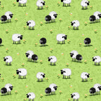 White and black sheep novelty print bright green meadow yellow flowers kids fabric for children's quilts baby quilts nursery décor patchwork projects