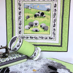 Lewe the Ewe green quilt panel finished wall hanging with sheep border bolster cushion and coordinate fabrics Susybee