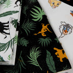 Disney Lion King fabric collection featuring character heads leaves and tropical prints for kids' quilts and patchwork sewing projects