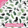 Disney Lion King character silhouettes tropical leaves white fabric for kids' quilts, jungle-themed projects and patchwork sewing projects