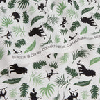 Disney Lion King character silhouettes tropical leaves white fabric for kids' quilts, jungle-themed projects and patchwork sewing projects