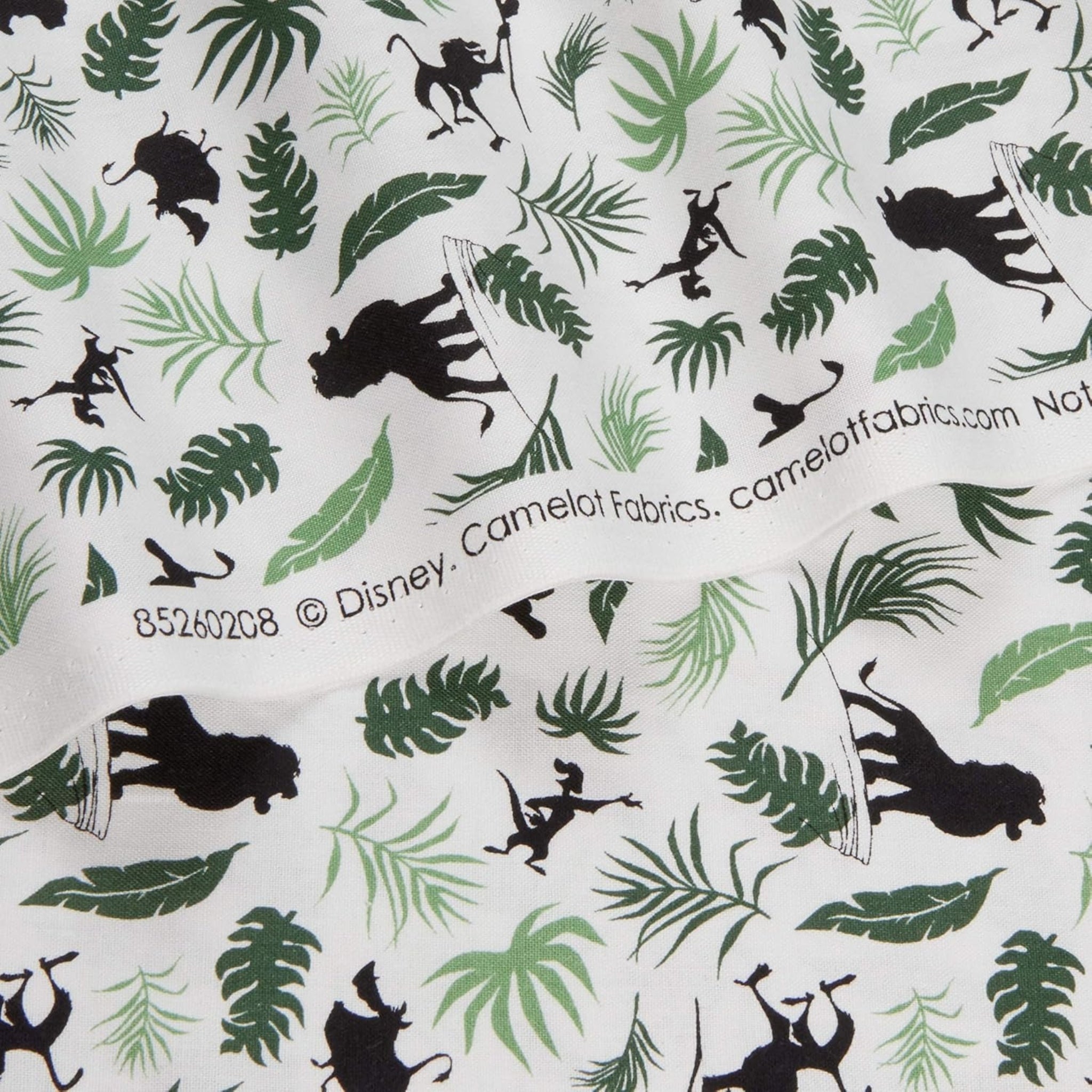 Disney Lion King character silhouettes tropical leaves white fabric for kids' quilts, jungle-themed projects and patchwork sewing projects