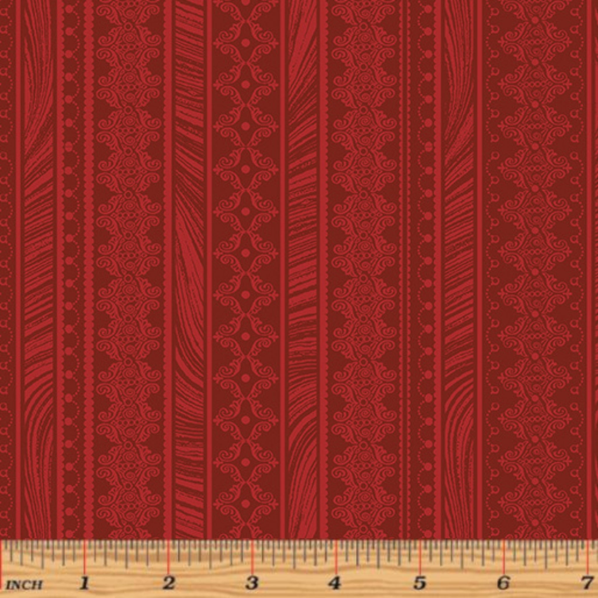 Tonal red fabric with vertical stripes of scrollwork and textured patterns