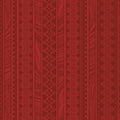 Tonal red fabric with vertical stripes of scrollwork and textured patterns