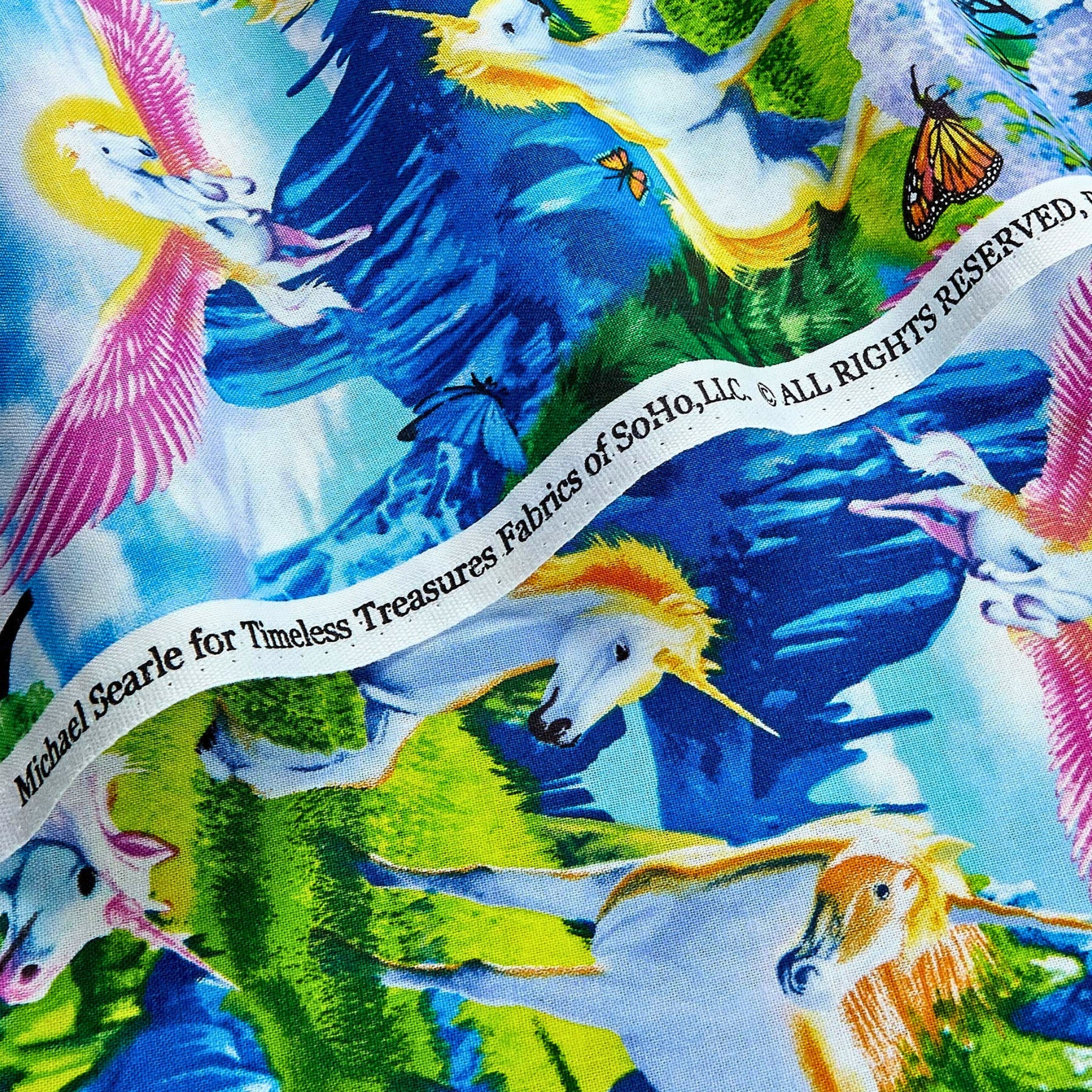 White unicorn pink pegasus fantasy landscape blue mountains waterfalls cherry blossom rainbows butterflies multicolour fabric for girls quilts and kids sewing projects