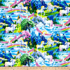 White unicorn pink pegasus fantasy landscape blue mountains waterfalls cherry blossom rainbows butterflies multicolour fabric for girls quilts and kids sewing projects