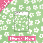 White flowers on green quilting cotton for patchwork and sewing