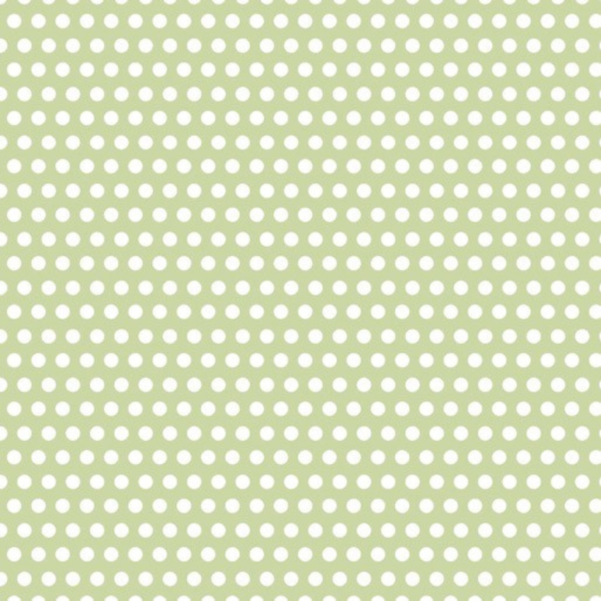White dots on pale green quilting cotton patchwork fabric blender for sewing projects
