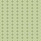 Flower-shaped geometric dots on pale green quilting cotton patchwork fabric blender for sewing projects