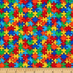 Puzzle pieces multicolour primary colours red blue green yellow orange cotton fabric for children's quilts kids novelty autism awareness patchwork
