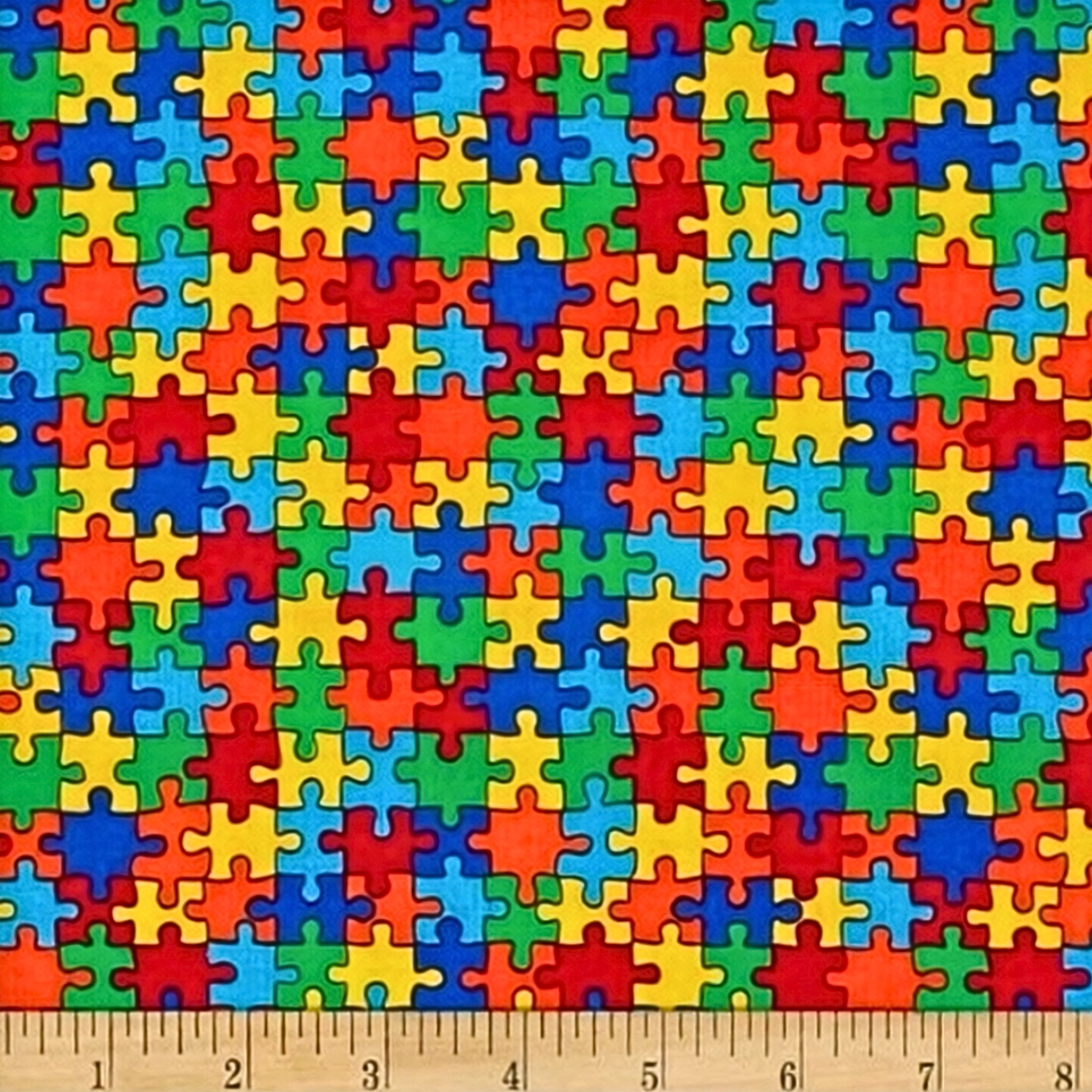 Puzzle pieces multicolour primary colours red blue green yellow orange cotton fabric for children's quilts kids novelty autism awareness patchwork