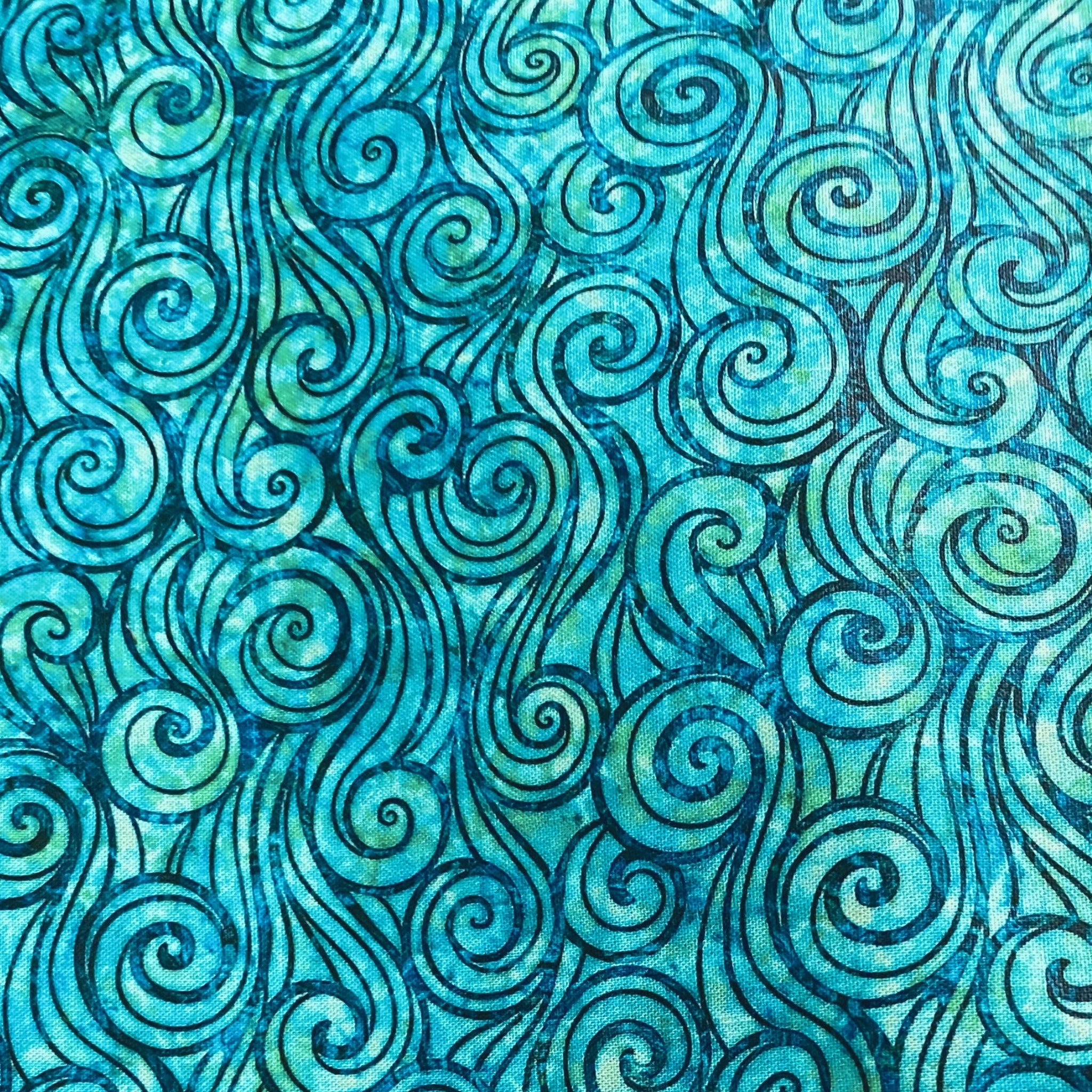 Swirling waves turquoise teal emerald green fabric for ocean-themed quilts coastal home décor and patchwork sewing projects