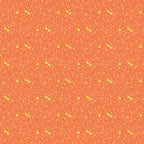 Tiny chicks clover buds white dots coral orange ditsy fabric for baby quilts children's quilts nursery décor and sashing