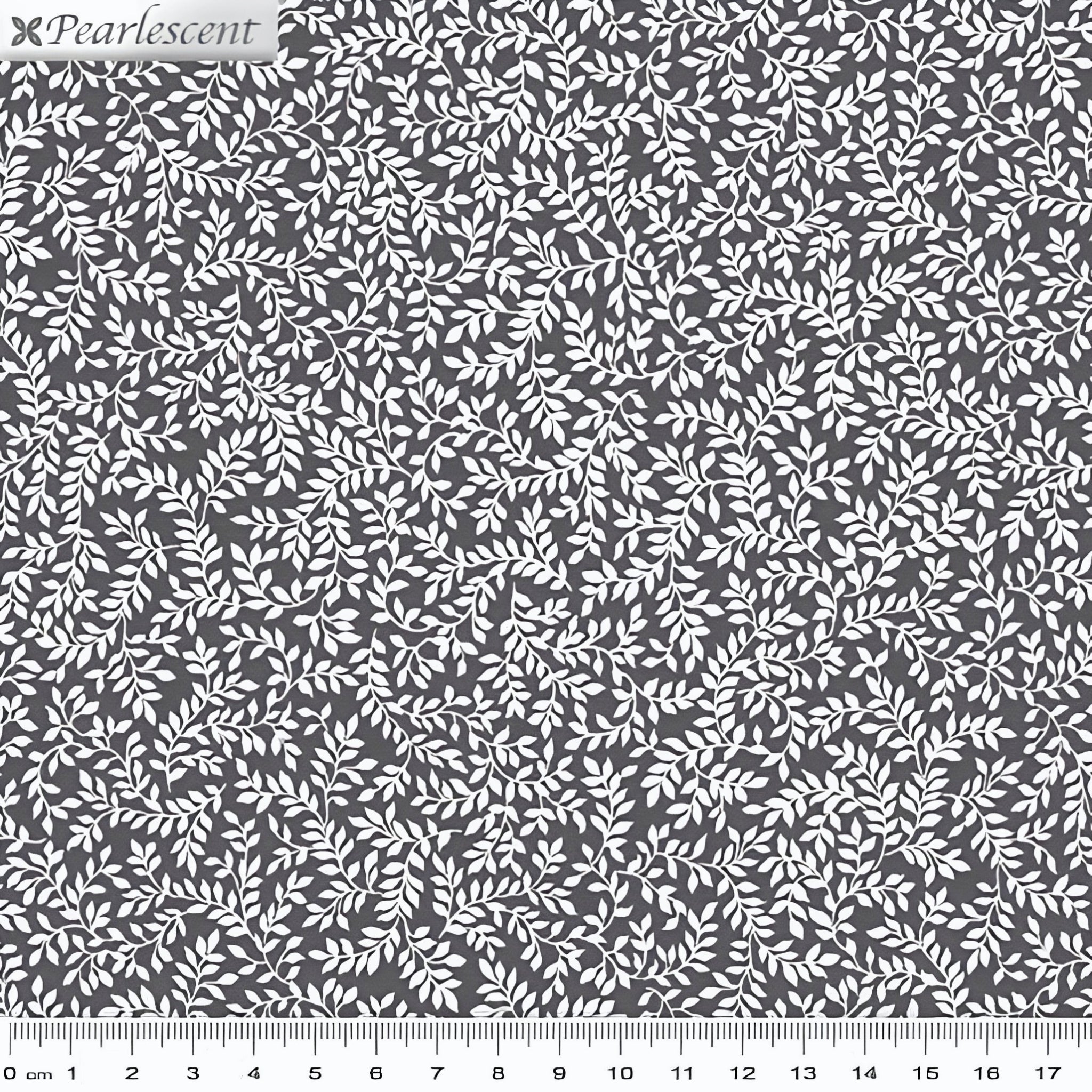 Silver pearlescent fern sprig blender charcoal grey background quilting fabric for quilts cushions and table linen