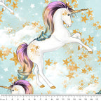 White unicorn rainbow mane gold horn soft blue fabric for girls quilts cushion covers dresses book bags and kids sewing projects
