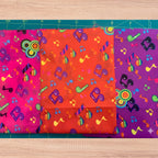 Tossed rainbow striped music notes hot pink red and purple novelty retro fabric colourways Shamash Sons 2084