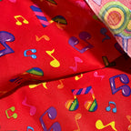 Tossed rainbow striped music notes yellow green blue purple pink red novelty retro fabric for music quilts bags vests retro skirts and sewing