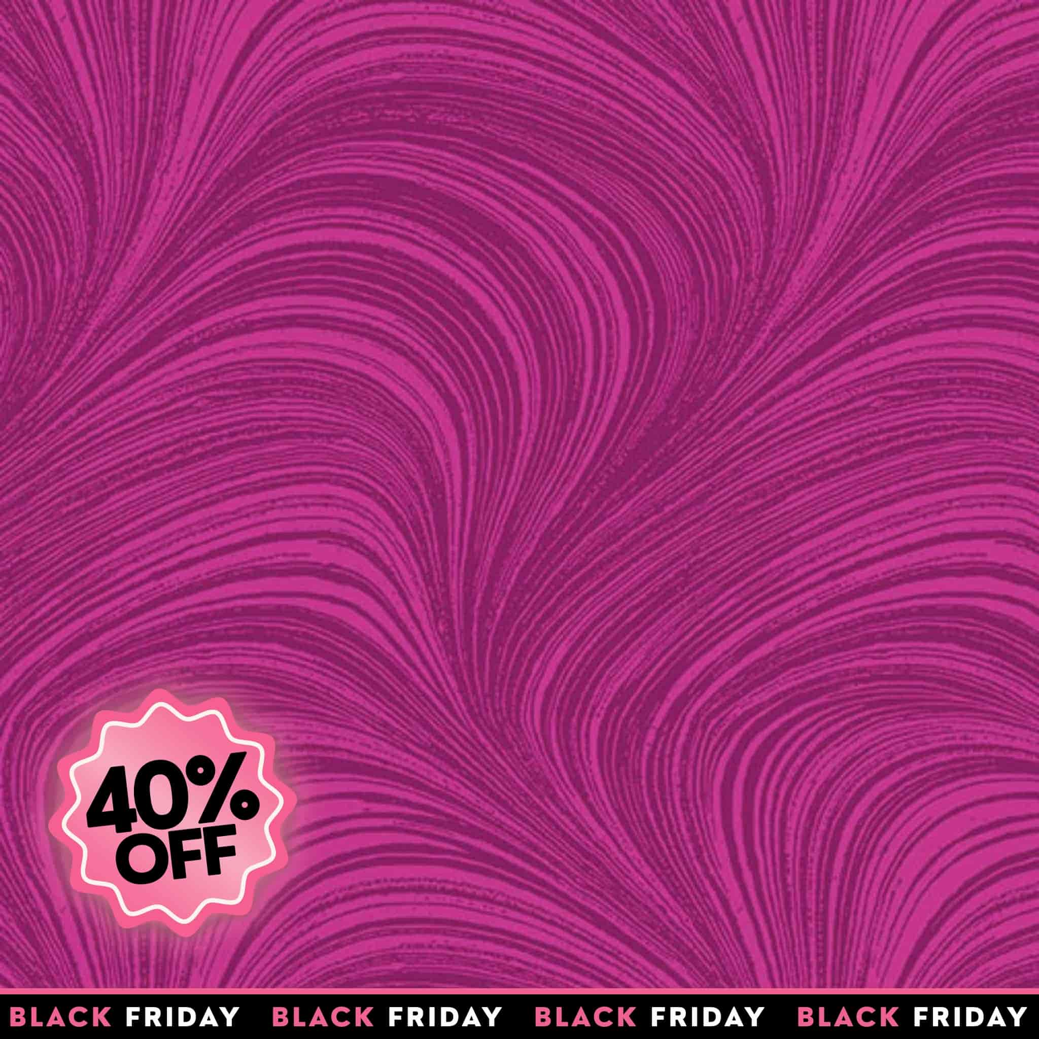 Discount sale tonal fuchsia pink fabric with an all-over wave and brushstroke pattern, perfect as a quilt blender