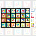 Sewing novelty fabric panel machines dress forms thread spools scissors and pincushions in multicolour blocks on black with quilt label blocks for sewing-themed quilts tote bags and patchwork projects
