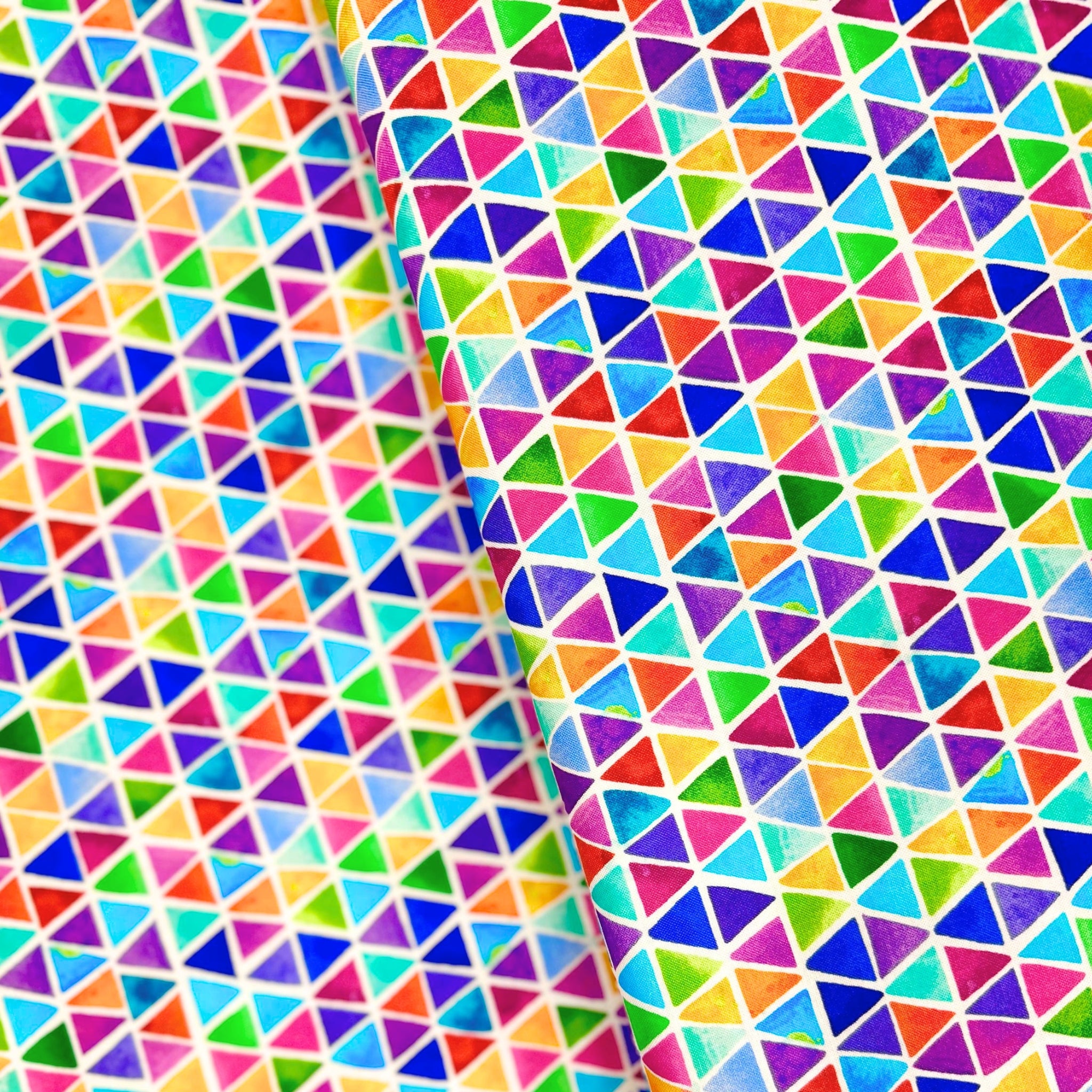 Watercolour rainbow triangle geometric blender red orange yellow green blue purple pink turquoise white background digital print fabric for children's quilts triangle blocks and bags