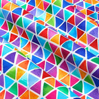 Watercolour rainbow triangle geometric blender red orange yellow green blue purple pink turquoise white background digital print fabric for children's quilts triangle blocks and bags