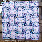 Spring Song quilt pattern pieced blocks floral rectangles blue green cream fabric for quilts and patchwork sewing projects