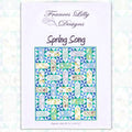 Spring Song quilt pattern pieced blocks floral rectangles blue green cream fabric for quilts and patchwork sewing projects