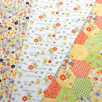 Susybee Sweet Bees bee flower sayings and hexagon fabric prints in yellow and green for baby quilts and novelty patchwork sewing projects