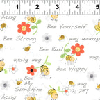 Yellow bees with flowers and Bee Kind words on white fabric for baby quilts nursery decor and children's patchwork sewing projects