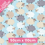 Fluffy stacked white taupe grey sheep varied wool textures aqua fabric for baby quilts nursery décor and patchwork sewing projects