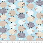 Fluffy stacked white taupe grey sheep varied wool textures aqua fabric for baby quilts nursery décor and patchwork sewing projects