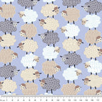 Fluffy stacked white taupe grey sheep varied wool textures periwinkle fabric for baby quilts nursery décor and patchwork sewing projects