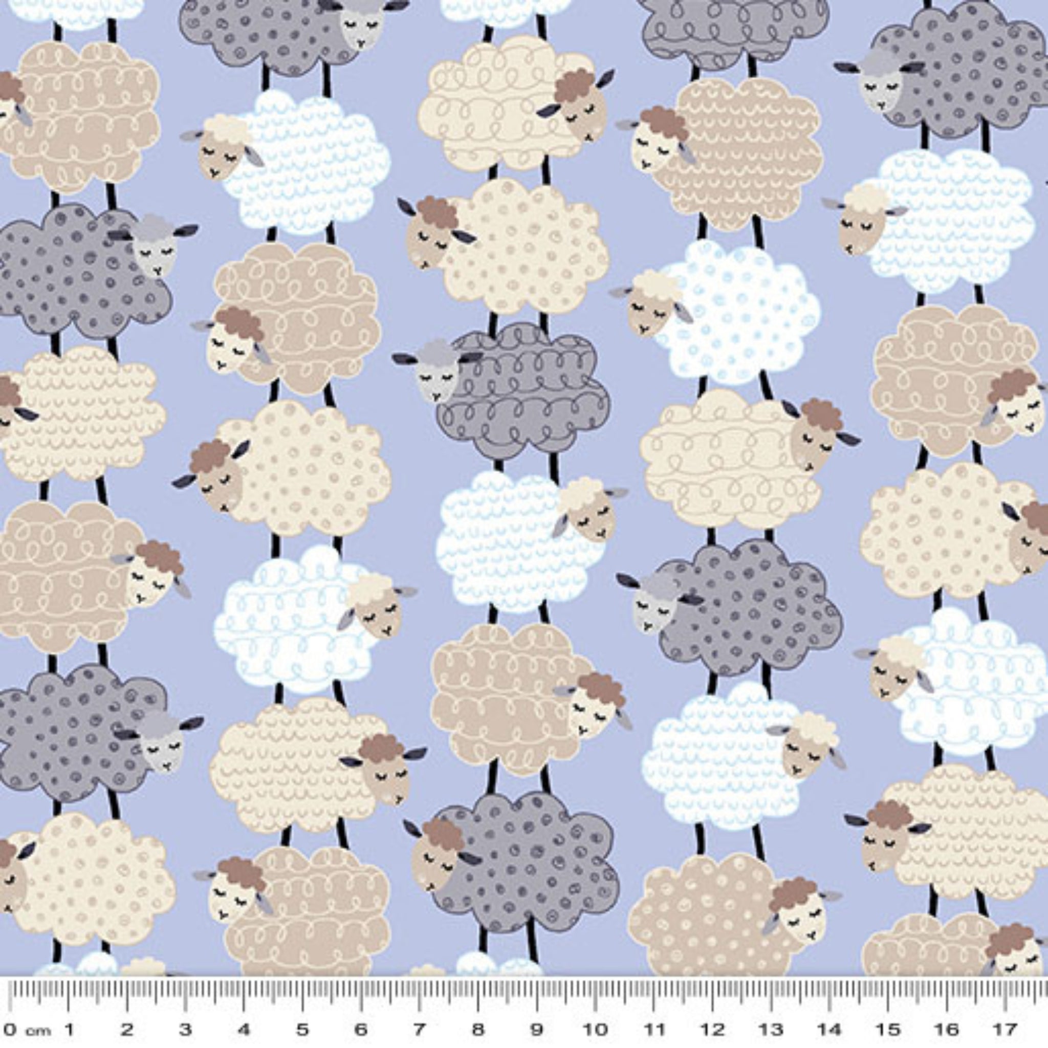 Fluffy stacked white taupe grey sheep varied wool textures periwinkle fabric for baby quilts nursery décor and patchwork sewing projects