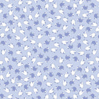 Tiny tossed white periwinkle blue sheep soft blue fabric for baby quilts nursery décor and patchwork sewing projects