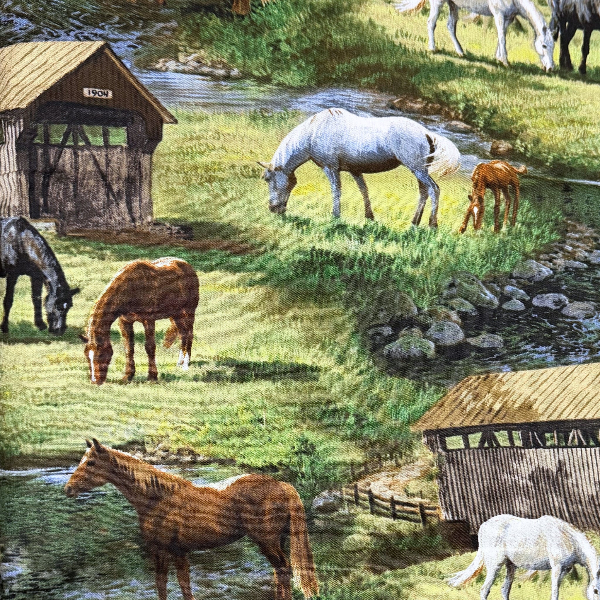 Realistic white black chestnut grey horses grazing rolling green meadows covered timber bridge rocky stream scenic quilting fabric horse lovers equestrians quilts cushions