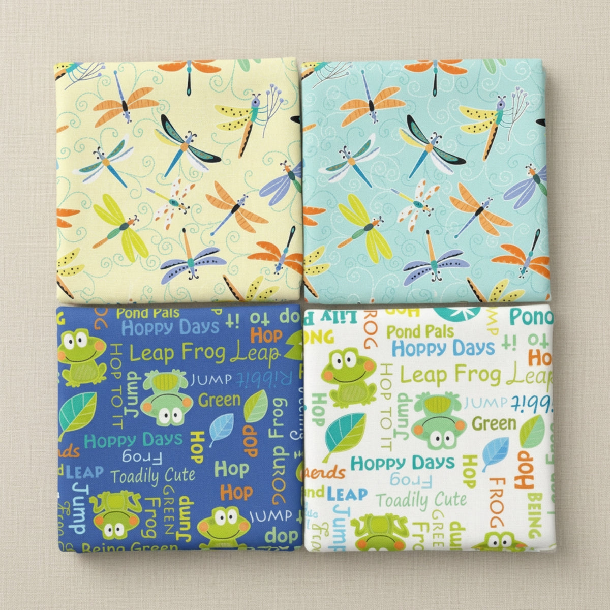 Dragonfly and frog words novelty quilting fabric fat quarters in cream aqua blue and white for kids baby quilts and patchwork projects