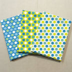 Hop Dot polka dot novelty quilting fabric fat quarters in blue lime and white for kids baby quilts and patchwork projects