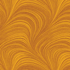 Tonal amber fabric with an all-over wave and brushstroke pattern, perfect as a quilt blender
