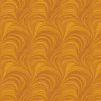 Tonal amber fabric with an all-over wave and brushstroke pattern, perfect as a quilt blender