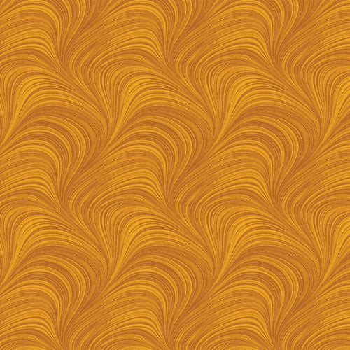 Tonal amber fabric with an all-over wave and brushstroke pattern, perfect as a quilt blender