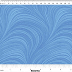Tonal light blue fabric with an all-over wave and brushstroke pattern, perfect as a quilt blender