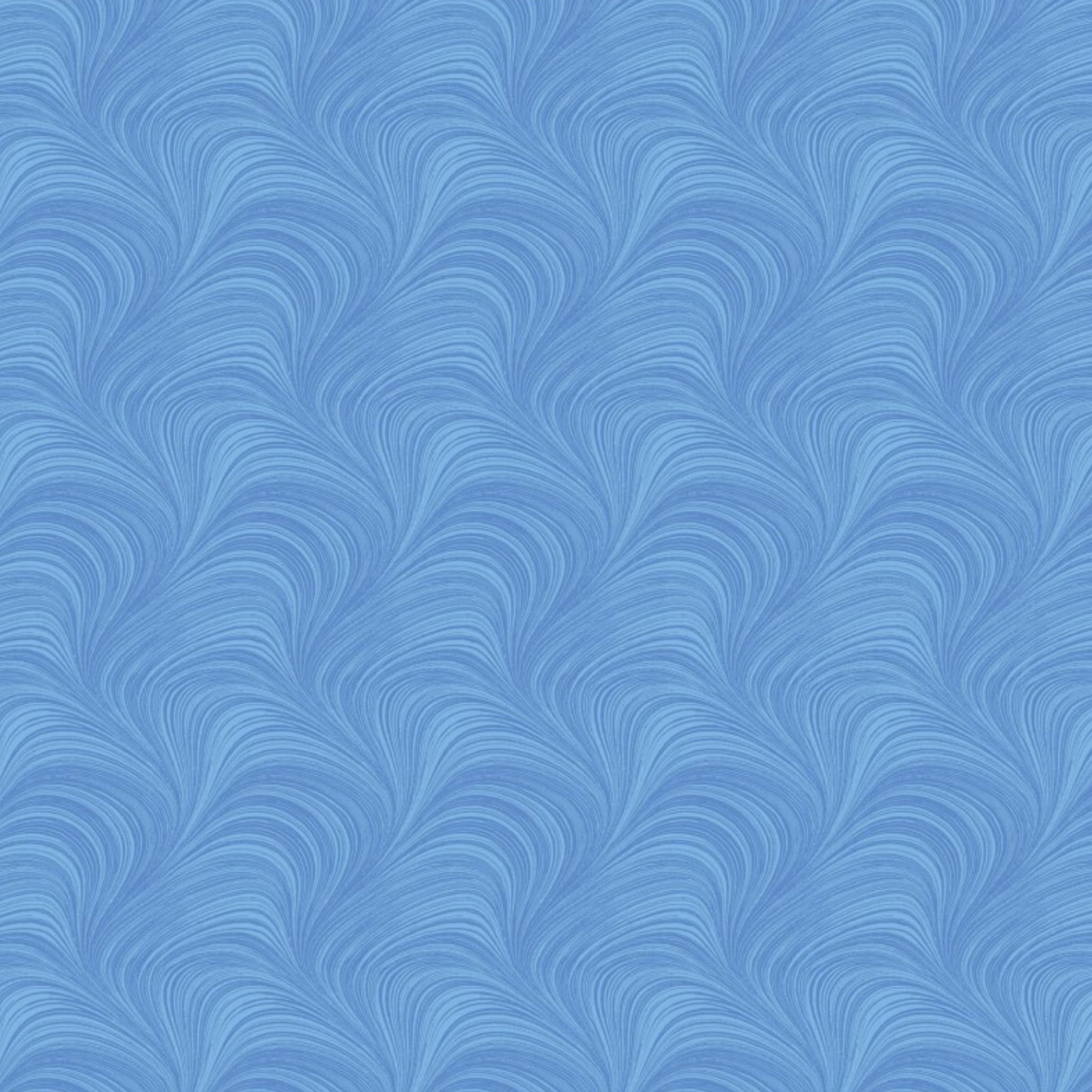 Tonal light blue fabric with an all-over wave and brushstroke pattern, perfect as a quilt blender