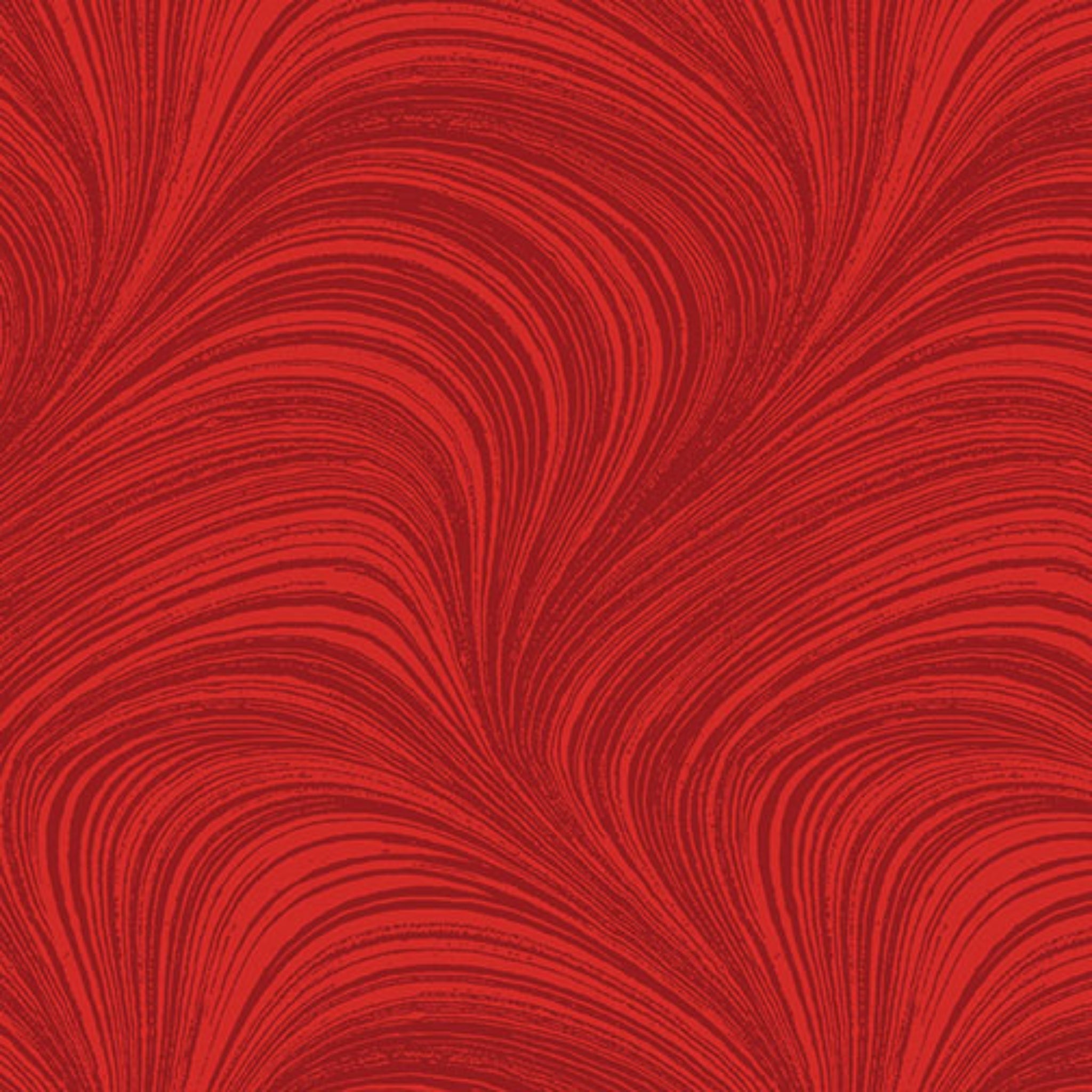 Tonal cayenne red fabric with an all-over wave and brushstroke pattern, perfect as a quilt blender