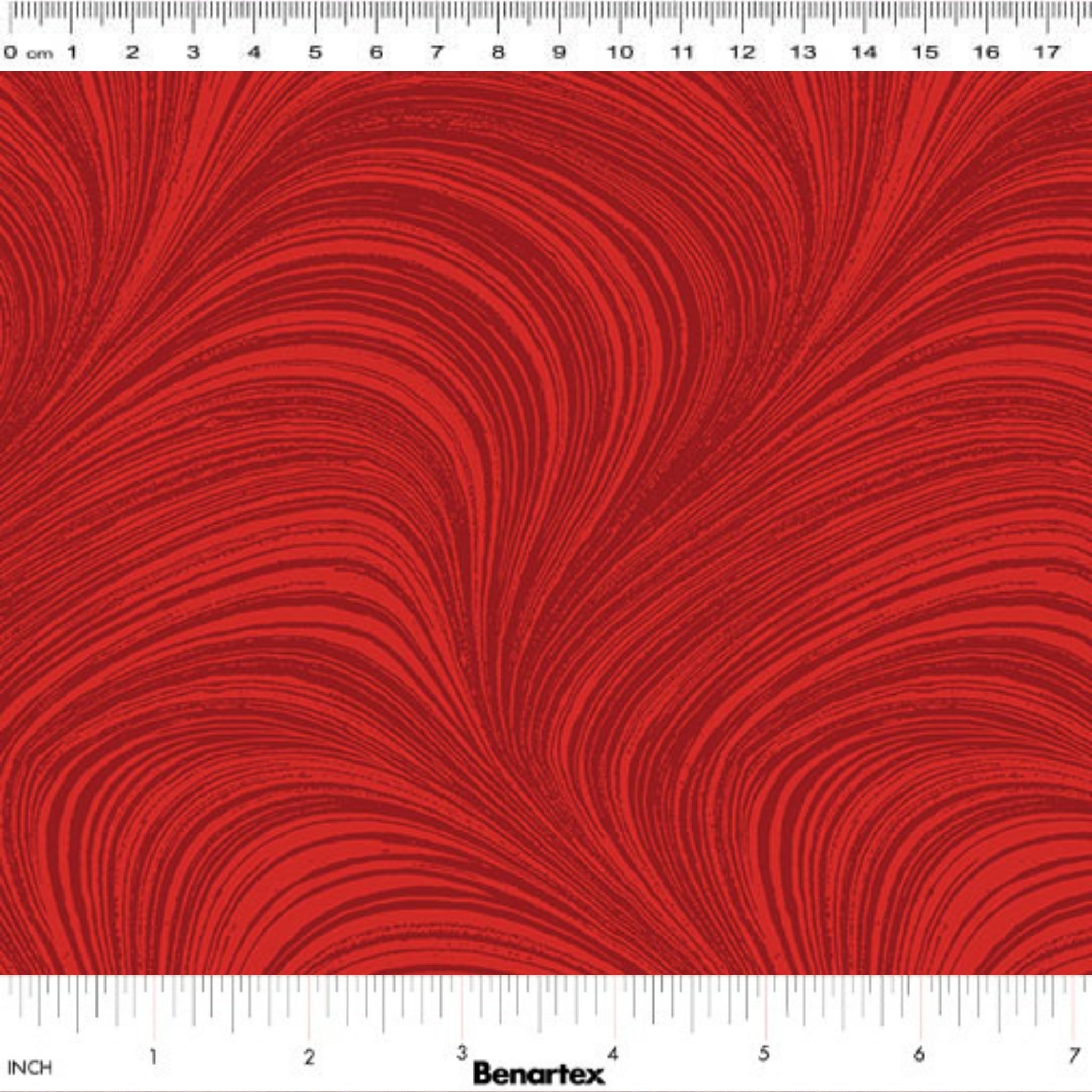 Tonal cayenne red fabric with an all-over wave and brushstroke pattern, perfect as a quilt blender