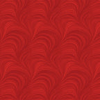 Tonal cayenne red fabric with an all-over wave and brushstroke pattern, perfect as a quilt blender