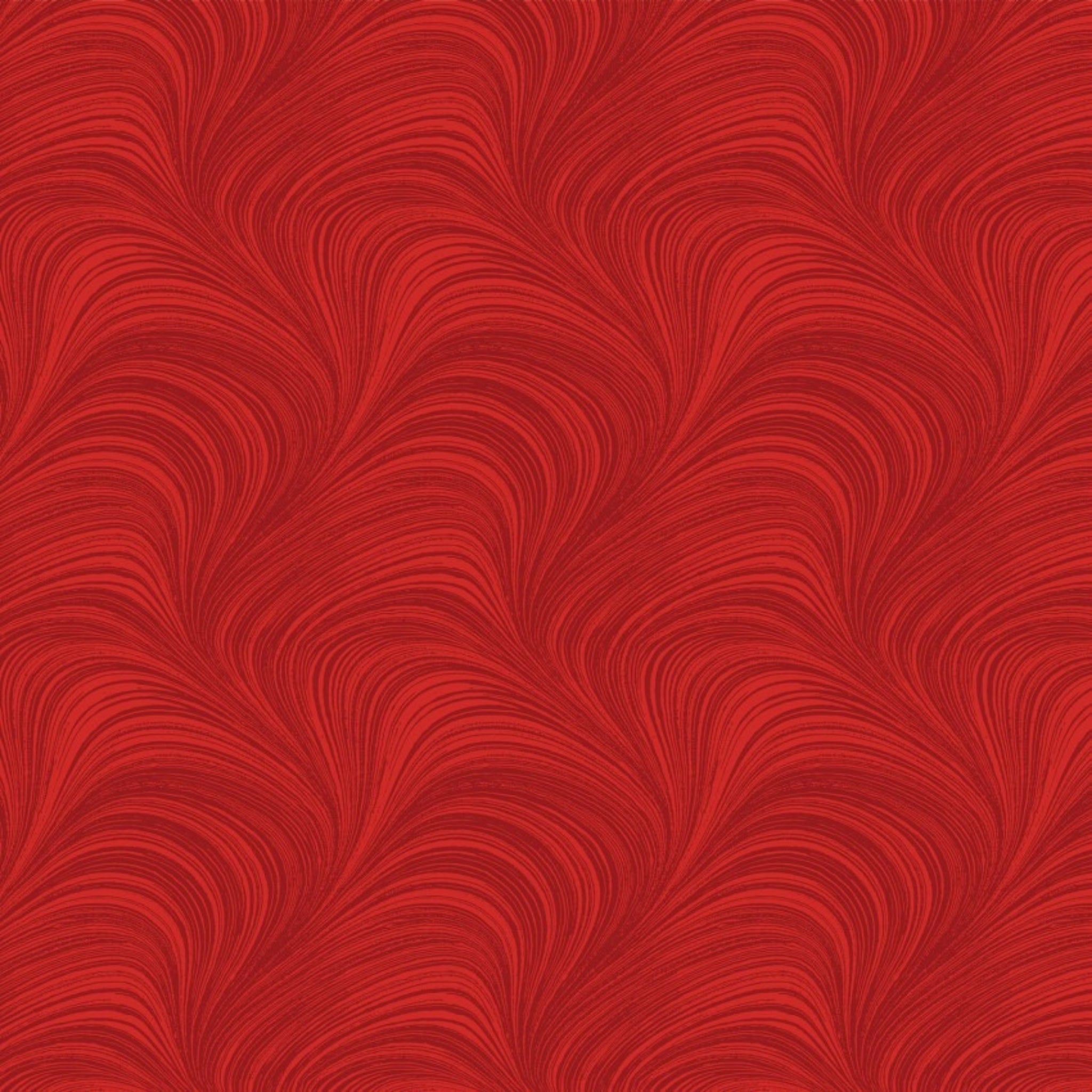 Tonal cayenne red fabric with an all-over wave and brushstroke pattern, perfect as a quilt blender